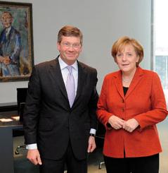 Dhimmi Frank Schira mit Angela Merkel