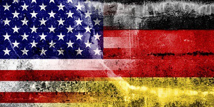 USA and Germany Flag painted on grunge wall