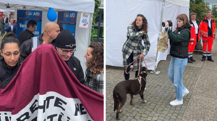 Dem baden-württembergischen Abgeordneten Hans-Jürgen Goßner wurde bei dem Antifa-Überfall auf den AfD-Stand von einer Linksextremistin (mit Hund) versucht, das Mobiltelefon zu entreißen.